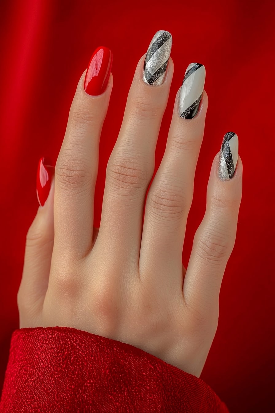 Simple Christmas nails with red and silver diagonal pattern design