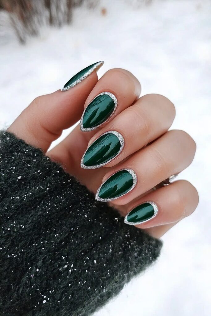 Emerald green Christmas nails with silver glitter outline