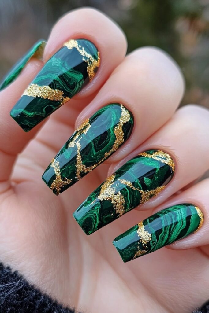 Emerald green Christmas nails with gold marble swirl design