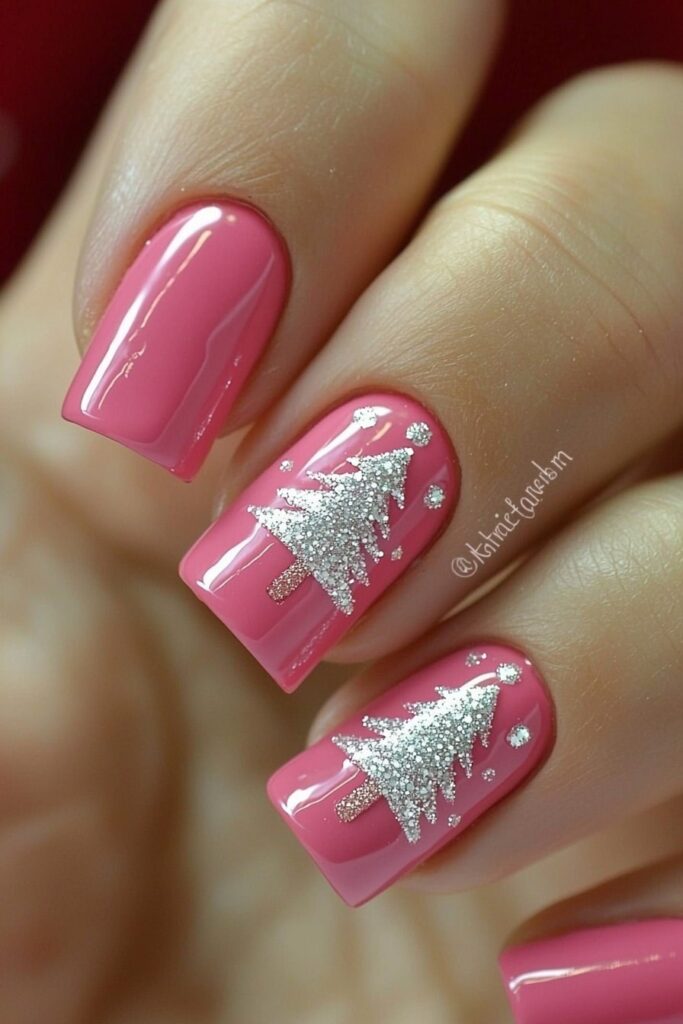 Pink Christmas nails with silver glitter tree designs