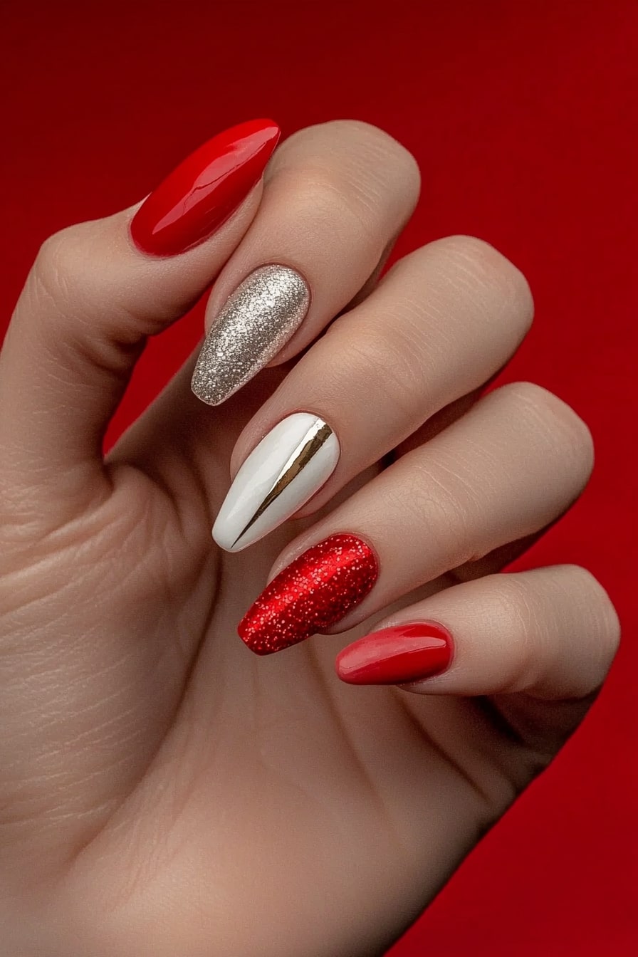 Classy Christmas nails with red and silver glitter gradient design