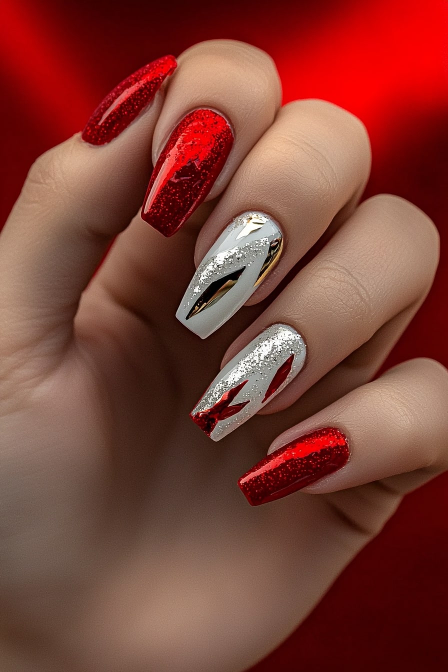 Simple classy Christmas nails with metallic red and silver abstract design