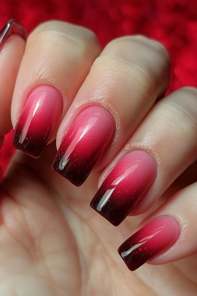 Pink and red Christmas ombre nails with dark tips