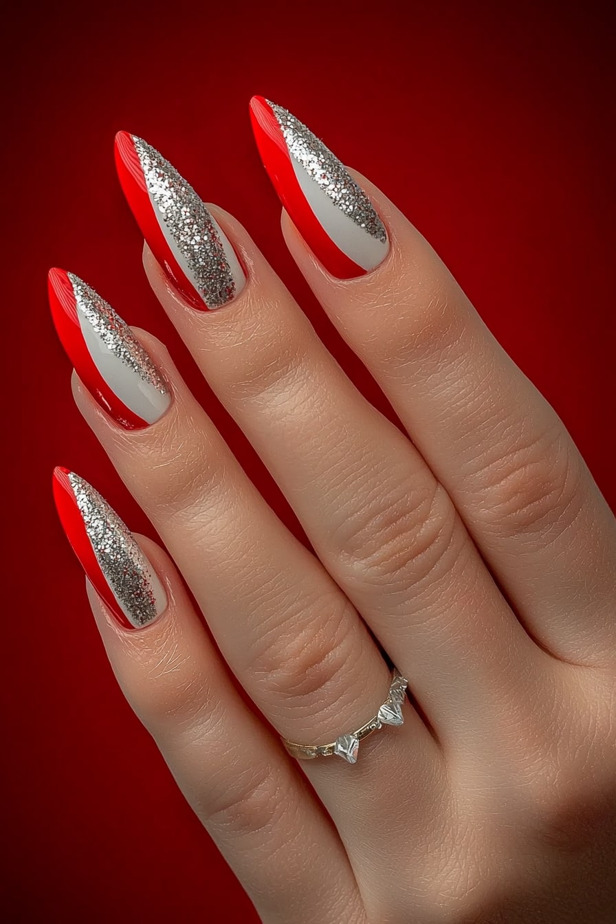 Simple classy Christmas nails with red tips and silver glitter accents