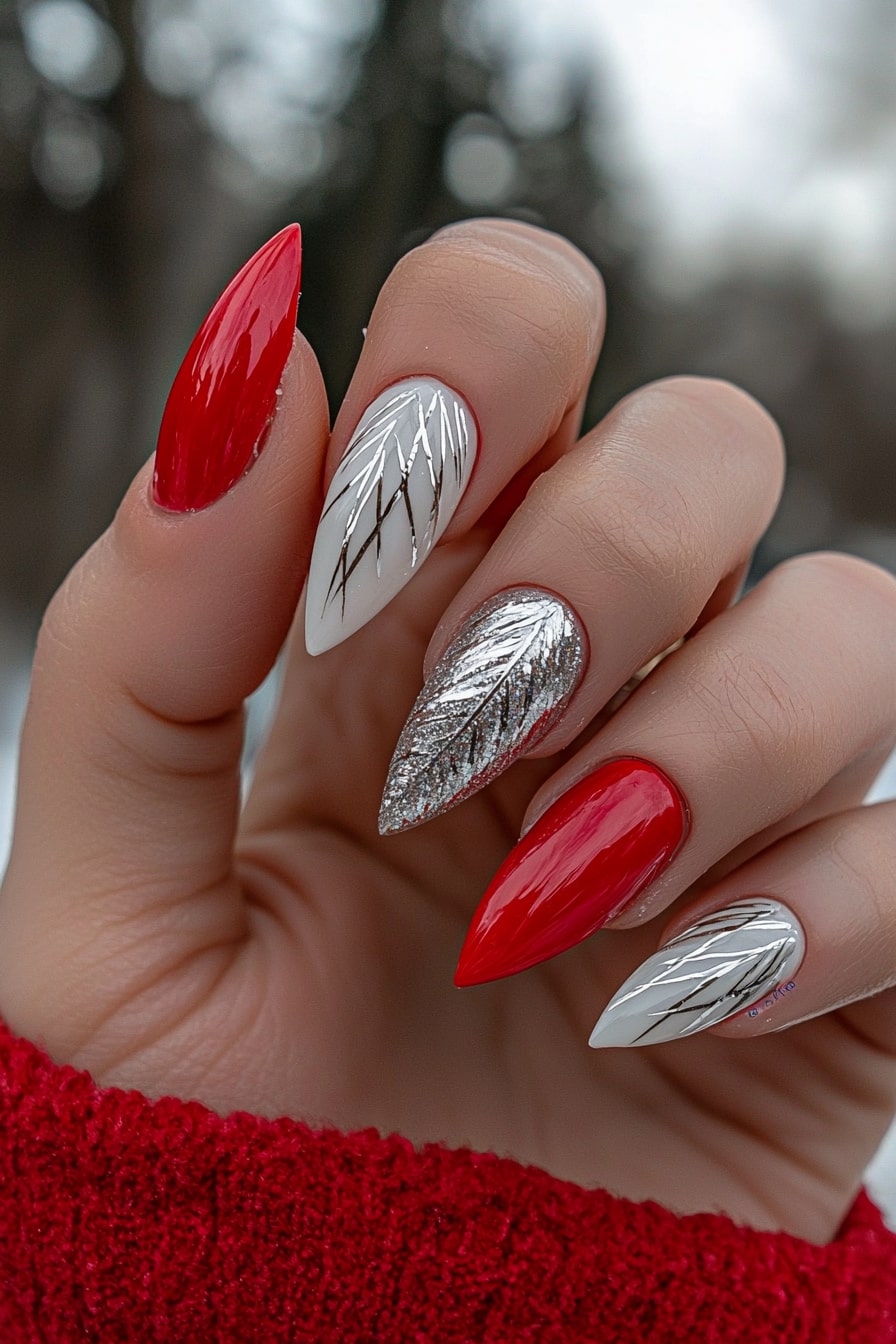 Simple classy Christmas nails with red and silver feather design