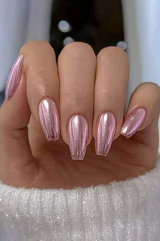 Wicked almond nails with shimmering rose gold metallic finish