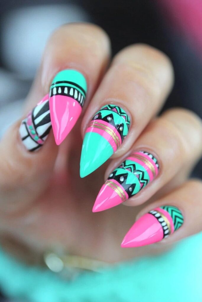 Wicked pink and mint tribal nails with geometric patterns