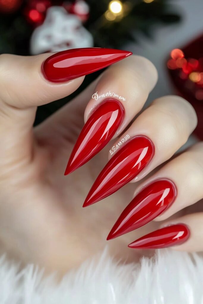 Christmas red acrylic nails with shimmering candy apple red color