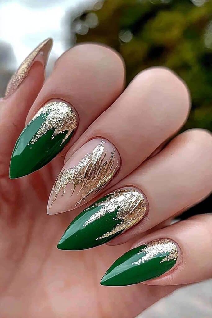 Wicked almond nails with emerald green and gold glitter skyline