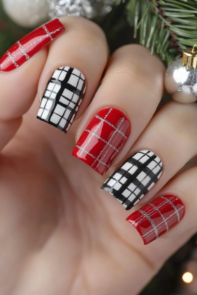 Christmas red acrylic nails with plaid pattern in red and white