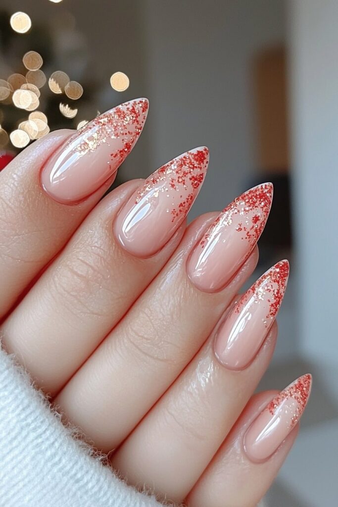 Christmas almond acrylic nails with red glitter gradient tips