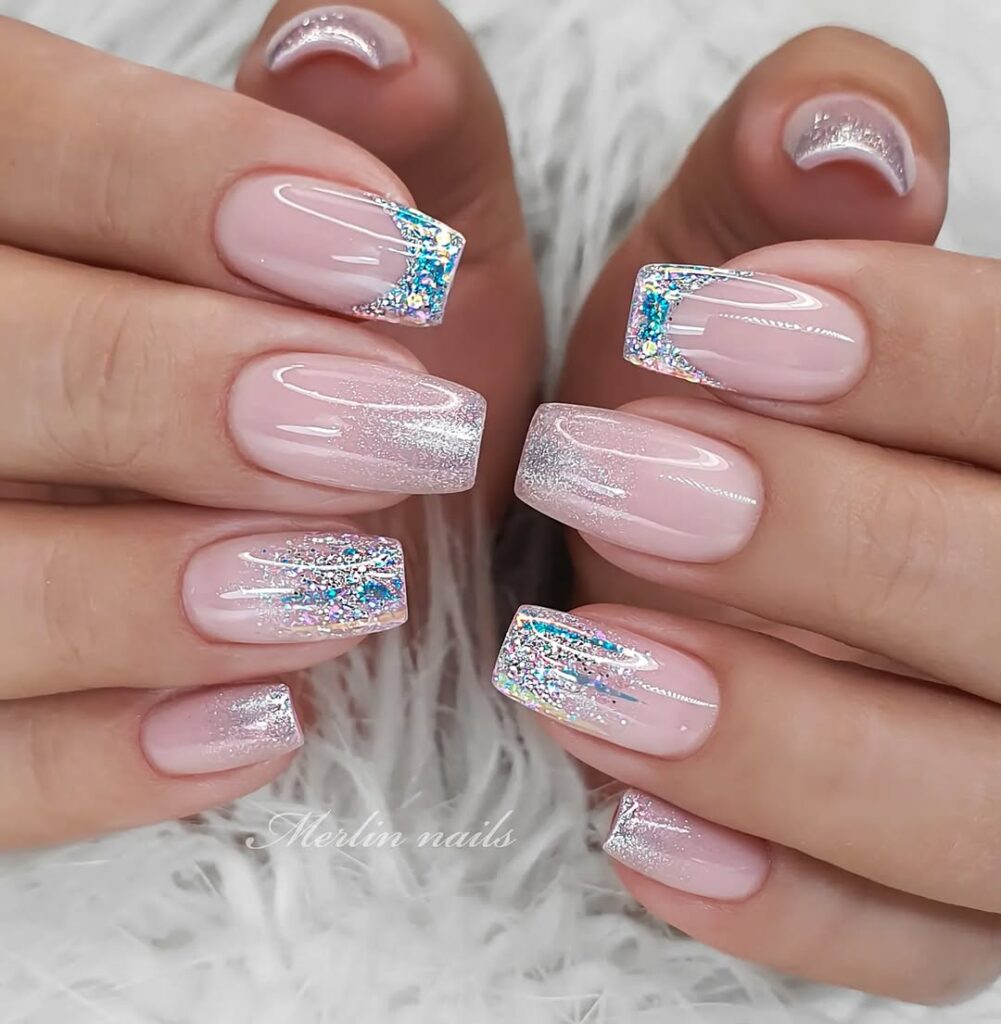 Short neutral winter nails featuring classic icy tips