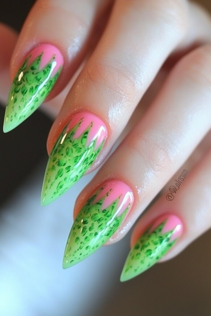 Pointy wicked nails pink and green resembling kiwi fruit pattern