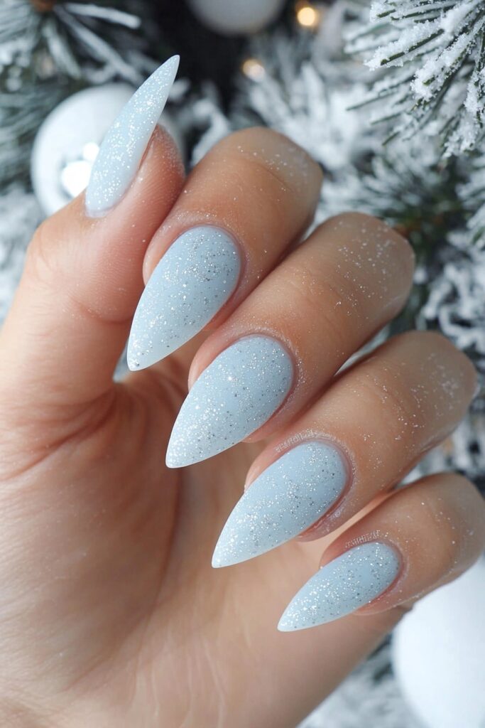 Christmas almond acrylic nails with sparkly matte white snowfall