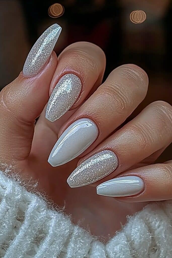 Minimalist neutral nails with a touch of sparkle.