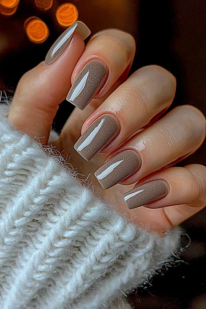 Gradient nails in warm mocha tones.