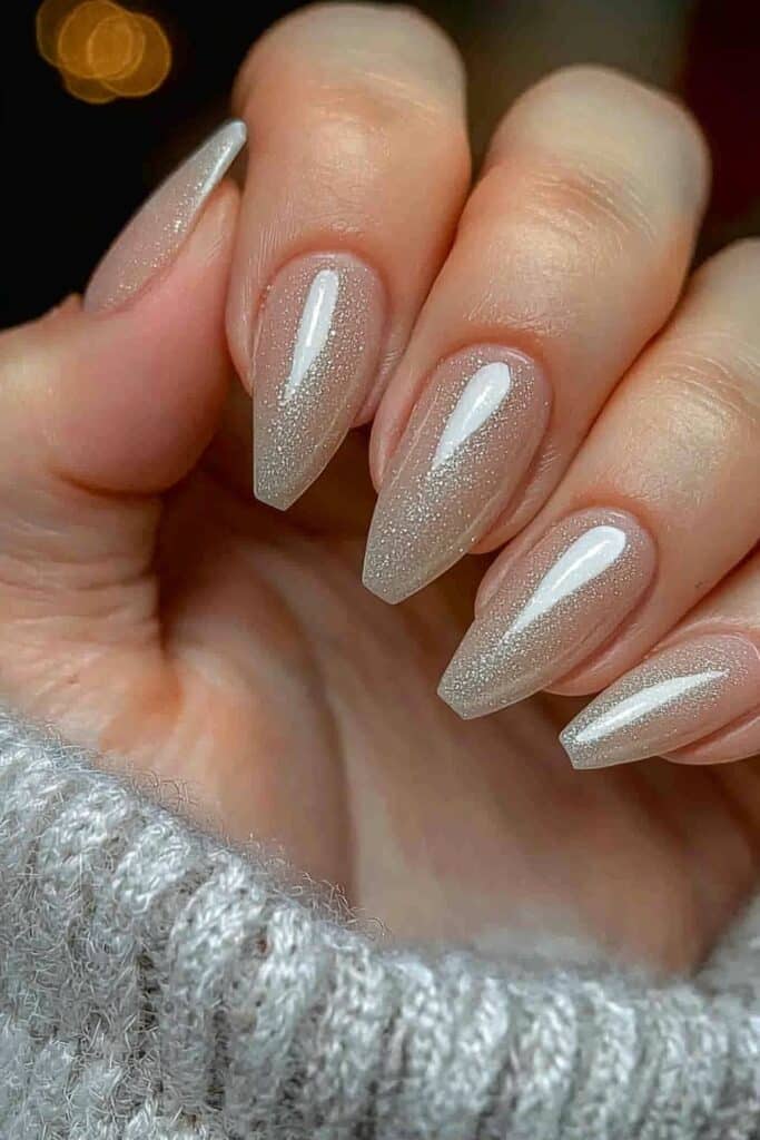 Soft cashmere-inspired neutral nail design.