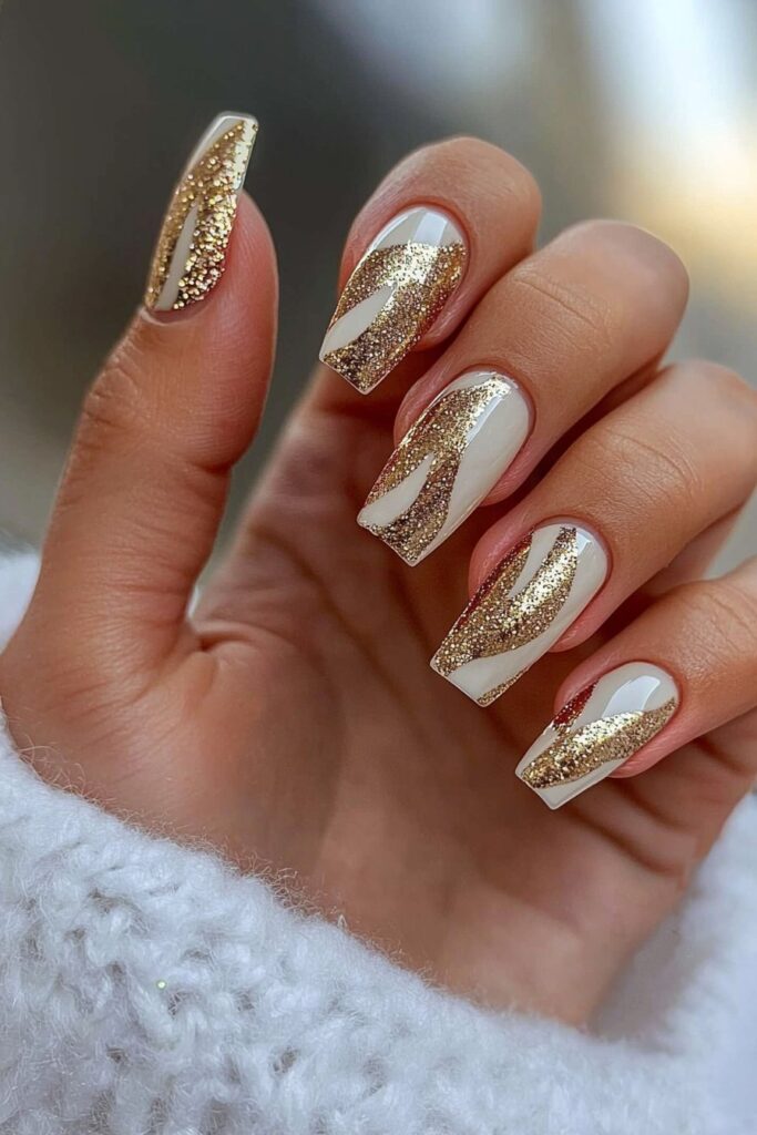 Short neutral winter nails with champagne glitter swirls