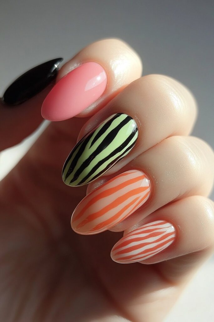 A striking nail design featuring an electric neon zebra print, combining bold black stripes with vibrant neon hues for a fierce and stylish edge.