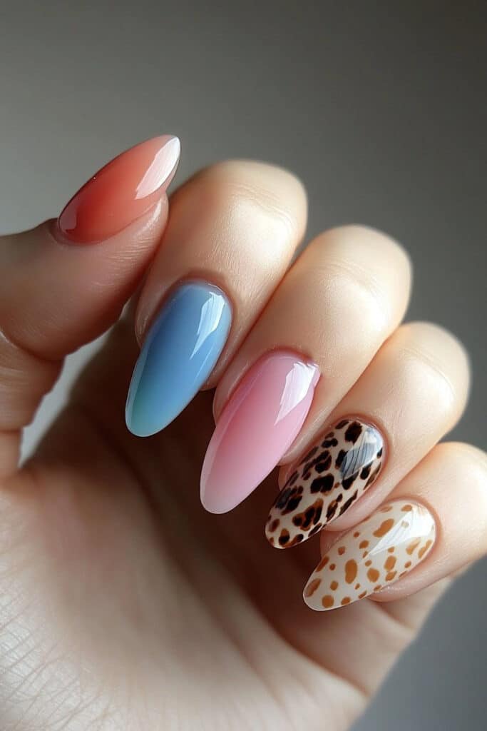 A daring summer nail design with neon animal print patterns on acrylic nails. Vibrant neon colors enhance the wild print for a bold statement look