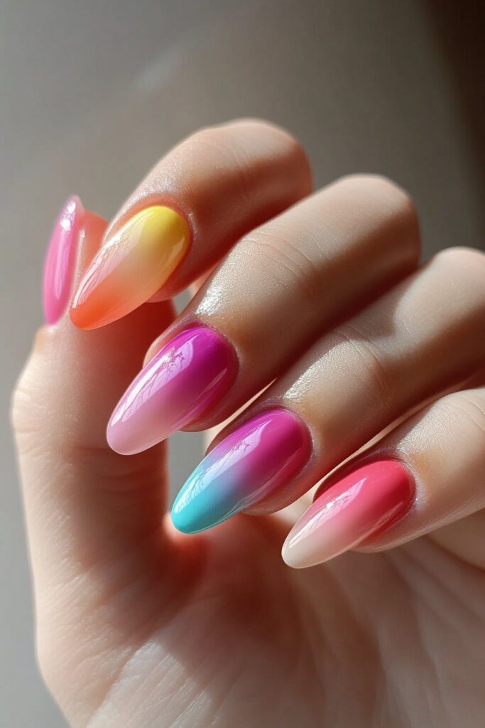 A vibrant nail design with a neon tie-dye pattern, swirling multiple neon shades into a bold and energetic blend for a trendy summer style.