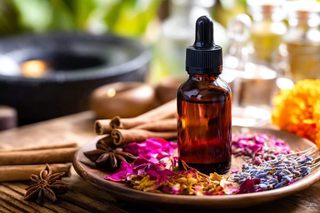 Arrangement of essential oil bottles and digestive herbs showcasing natural remedies for digestive health and wellness.