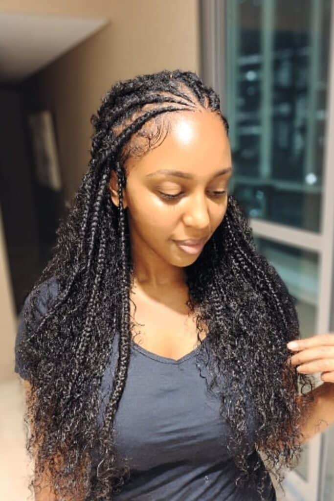 Large, thick braids that lie close to the scalp, often styled in elegant curved or straight patterns, creating a regal and sophisticated look.