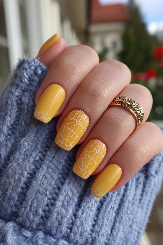 Square orange French tip nails with bold crocodile texture pattern, high-gloss finish, and exotic reptile-inspired design elements.
