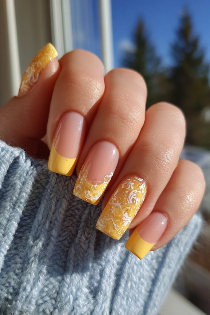 Artistic orange French tips featuring swirling curved patterns on each nail creating vibrant statement summer nail art design.
