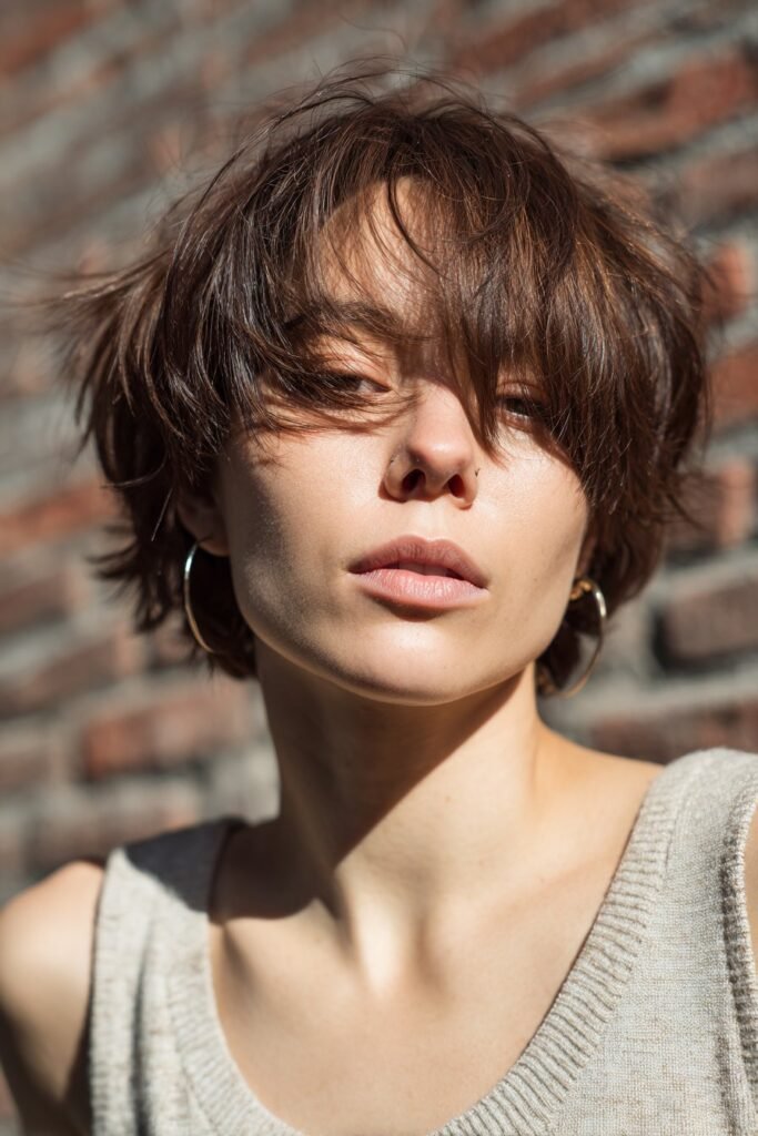 woman with choppy pixie shag hairstyle and messy short layers