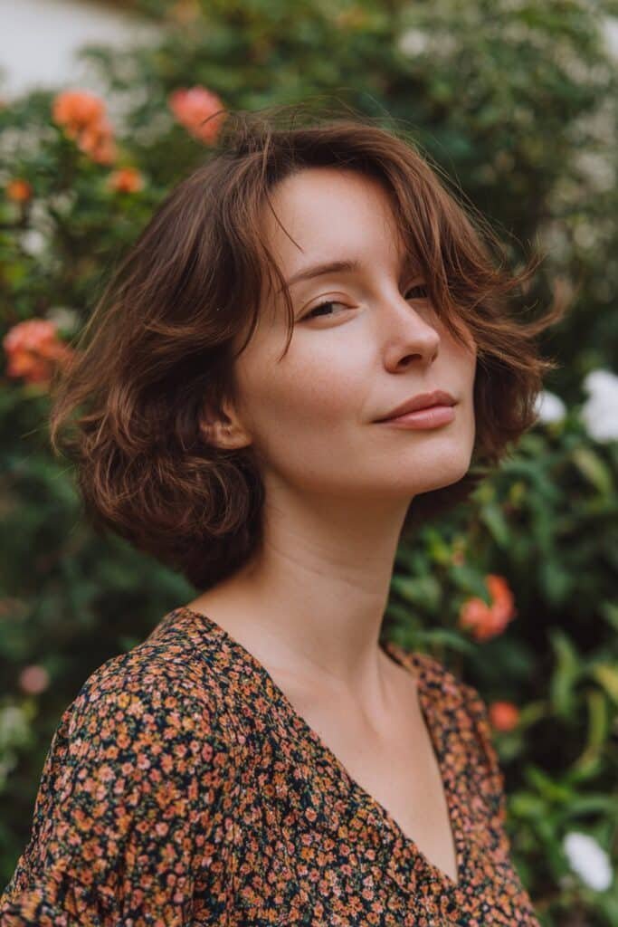 woman with soft layered shag haircut and light wispy ends