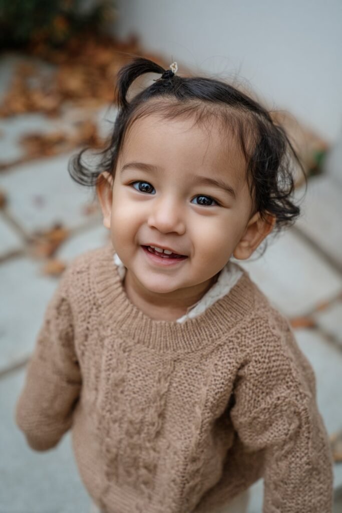 baby girl hairstyle with twisted side accent and clip