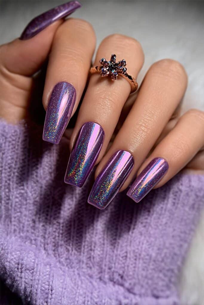 Almond-shaped metallic amethyst chrome nails with mirror shine.