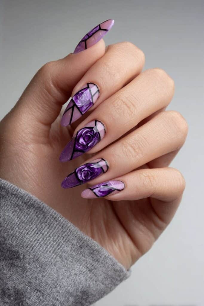Amethyst stained glass almond nails with segmented purple panels and thin black outlines, full hand with fingers curved inward.