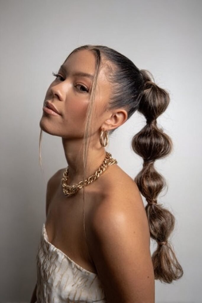 girl with bubble ponytail prom hairstyle