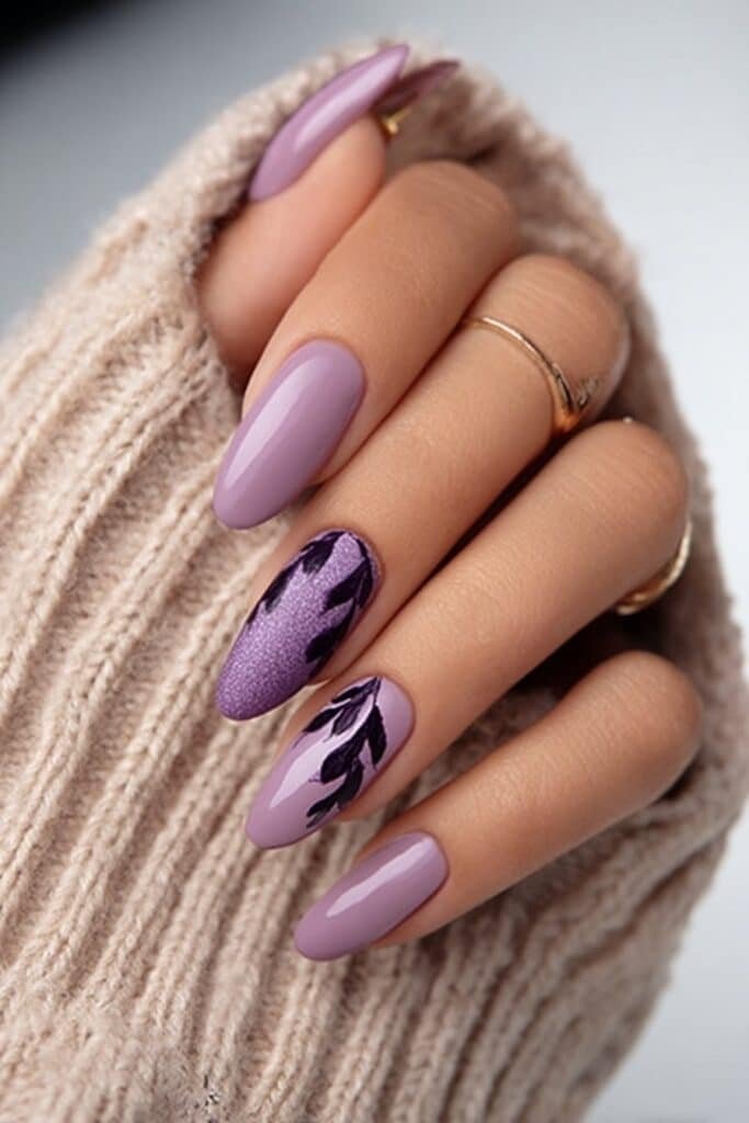 Frosted amethyst almond nails with soft matte icy purple finish, full hand with fingers curved inward.