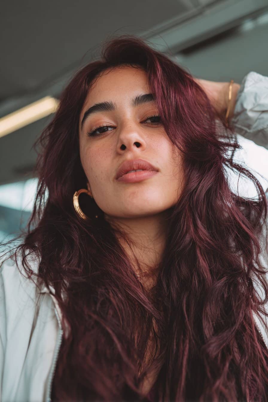 deep brunette hair blended with rich burgundy tones