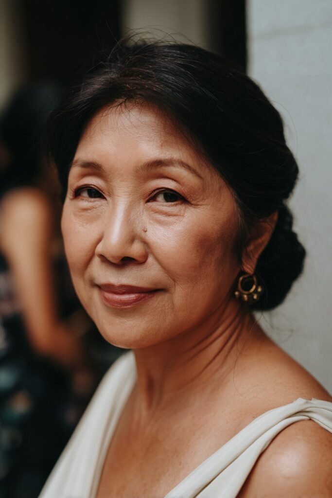 mother of the groom hairstyles classic chignon updo for older woman at wedding