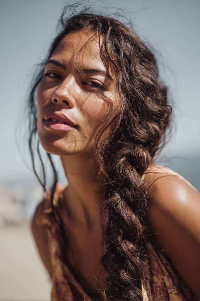 woman with fishtail braid hairstyle, detailed woven braid