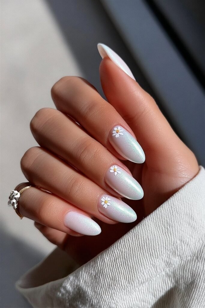 Iridescent white nails with soft shimmer and rainbow sheen.