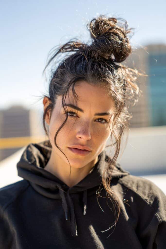 woman with knotted low bun hairstyle, textured knots