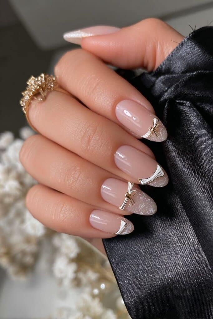 Nails with hand-painted diploma art and subtle gold accents.