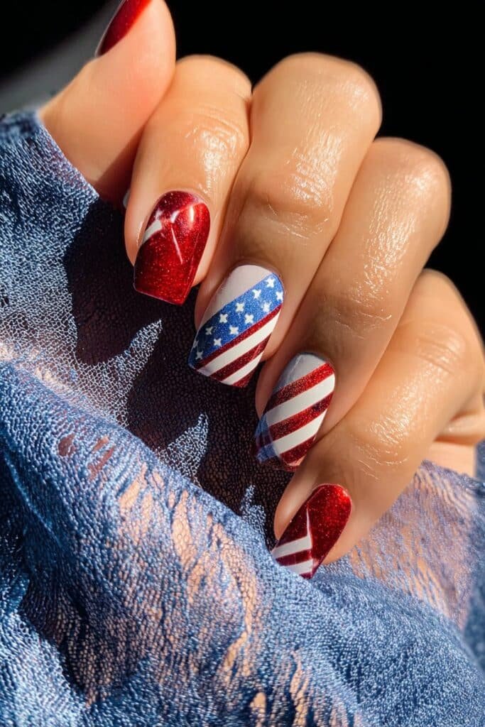 Red, white, and blue striped nails in bold patterns.