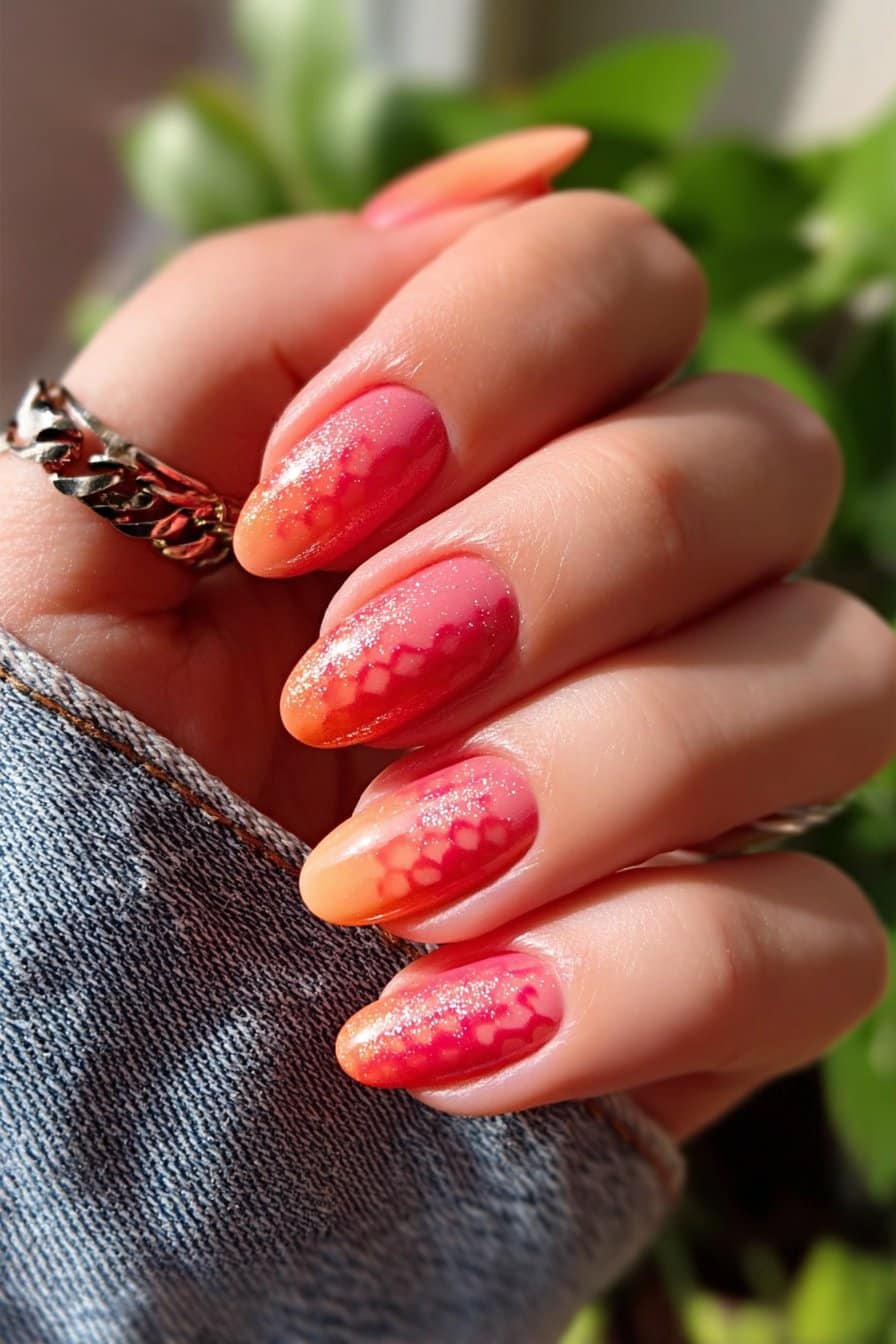 Pastel ombre nails blending orange, lavender, and mustard shades.