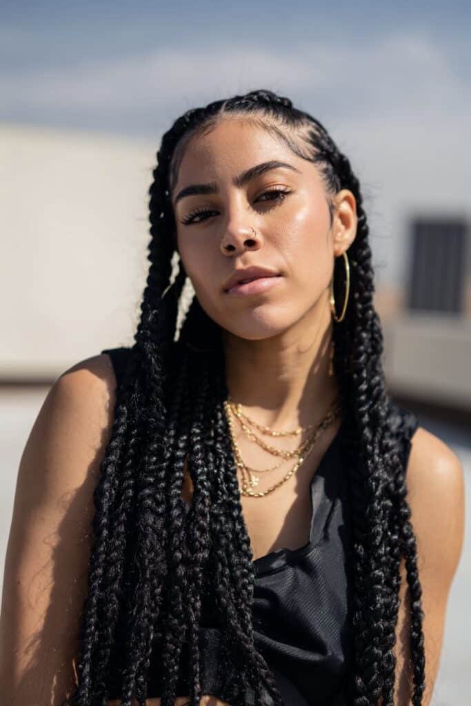 woman with senegalese twists hairstyle, smooth rope twists