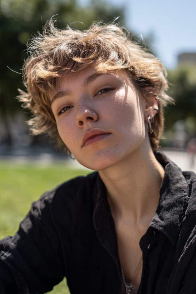 shaggy wolf cut with layered texture and volume, trendy medium hairstyle