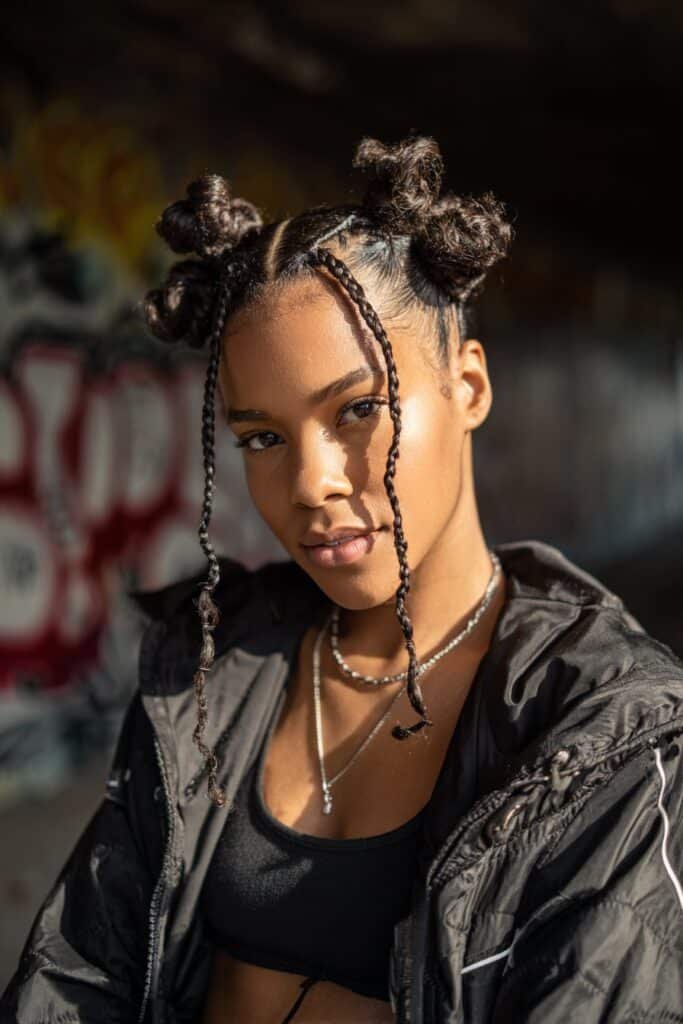woman with bold bantu knots hairstyle