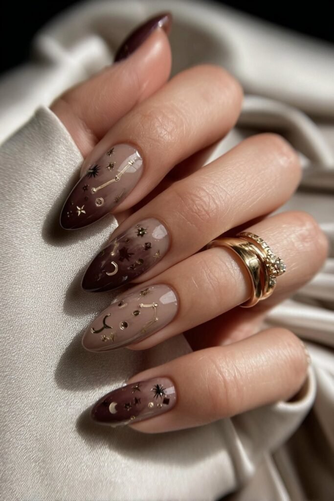 Dark Taurus nails with celestial stars and bull constellation designs.