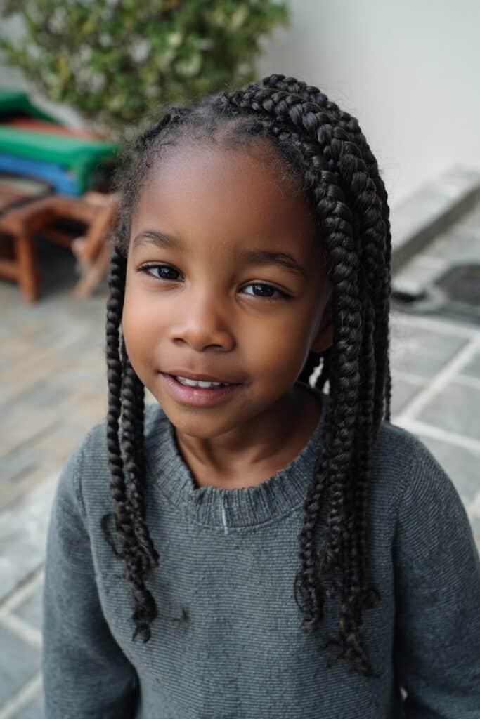 girl with feed-in braids hairstyle, gradual braids