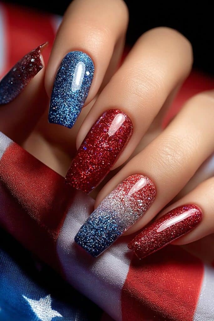 Patriotic glitter nails with bold red, white, and blue sparkle.